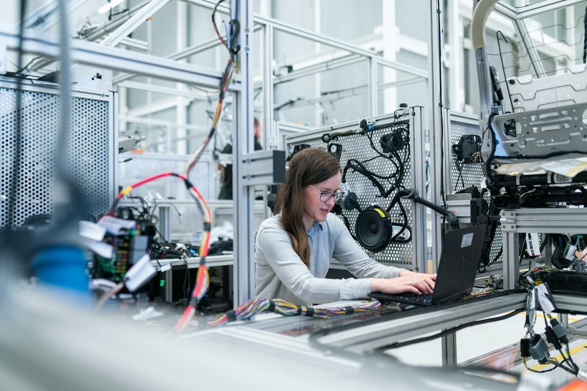Engineer reviewing product design at a workbench