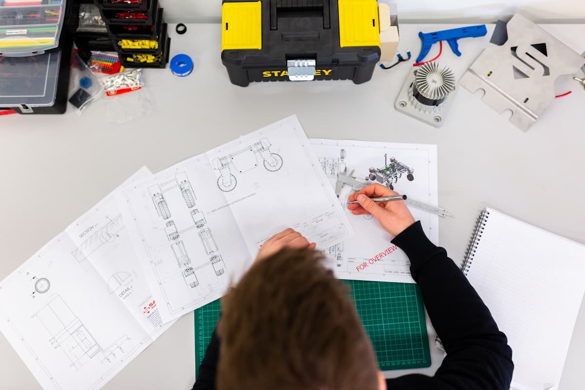 Product prototype iterations on a workshop bench